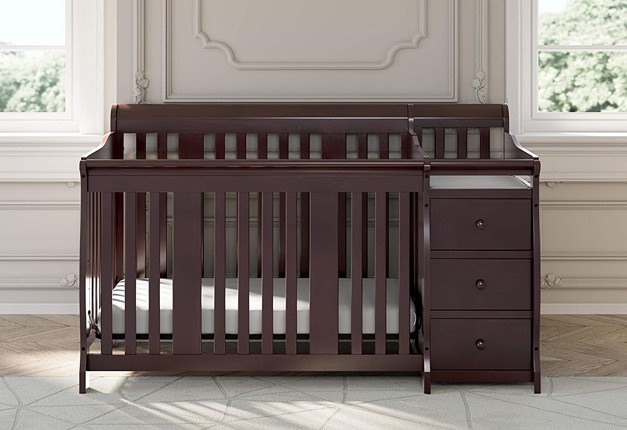 Baby crib with outlet storage underneath