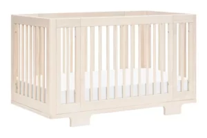 The Babyletto Yuzu 8-in-1 convertible All-Stages crib in Washed Natural color.