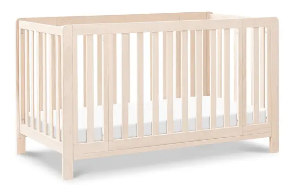 The DaVinci Carter's Colby Grow 6-in-1 convertible bassinet to crib in Washed Natural color.