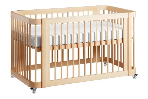 The Nestig Wave convertible crib in Washed Natural color.